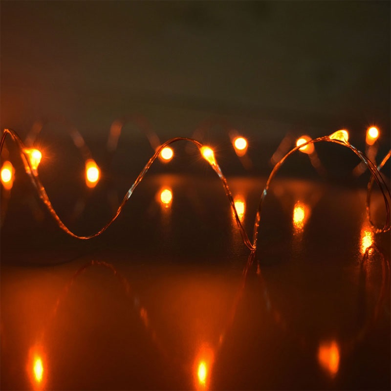 Christmastopia.com - 60 Orange LED Thin Wire Micro Lights Clear Wire