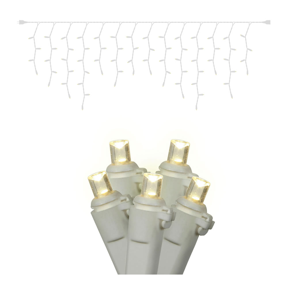 Christmastopia.com 70 Commercial Grade LED 5MM Wide Angle Warm White Christmas Icicle Lights 3.5 Inch Spacing White Wire